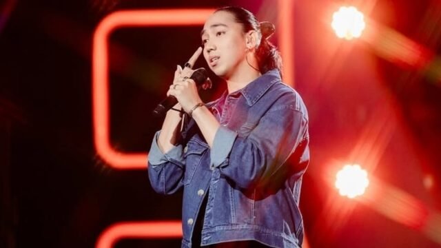 Dandy Panjawi tampil di panggung Indonesian Idol dan berhasil lolos ke Top 9